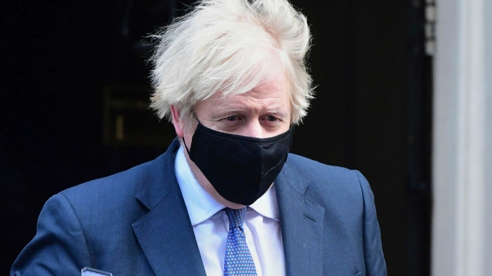Britain's Prime Minister Boris Johnson leaves 10 Downing Street, bound for the House of Commons where lawmakers are to vote on restrictions imposed in England's third national lockdown. (Photo / AP)