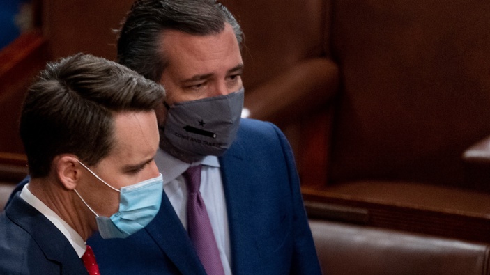 Senators Josh Hawley, left, and Ted Cruz speak after Republicans objected to certifying the Electoral College votes from Arizona. (Photo / AP)