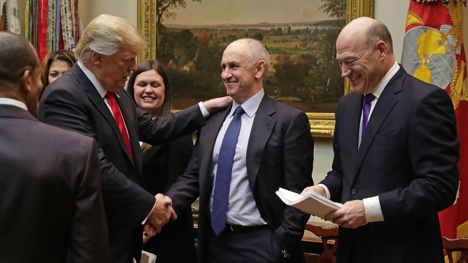 US President Donald Trump (left) calls White House Director of Strategic Initiatives Chris Liddell (centre). Photo / Supplied