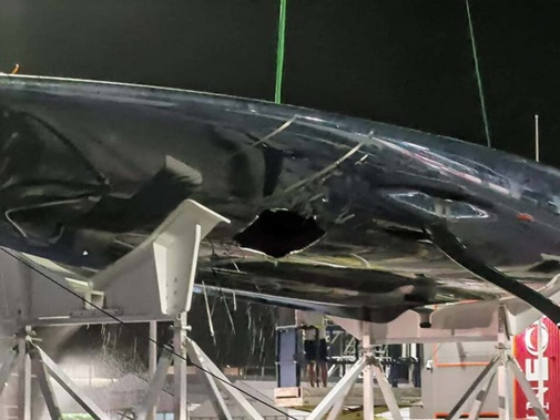 The hole in the hull of American Magic following Sunday's capsize. Photo / Will Trafford