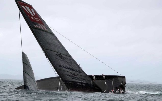 American Magic capsizes and nearly sinks. Photo / Michael Craig