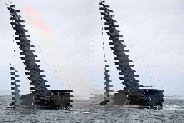 American Magic capsizes and nearly sinks. Photo / Michael Craig