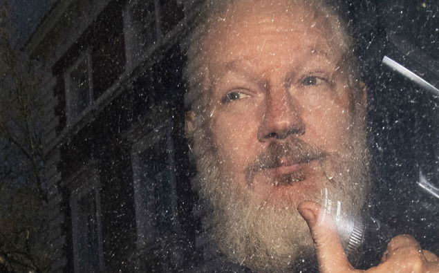 Julian Assange at an earlier court appearance. (Photo / AP)