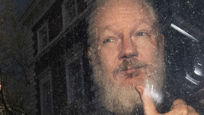 Julian Assange at an earlier court appearance. (Photo / AP)
