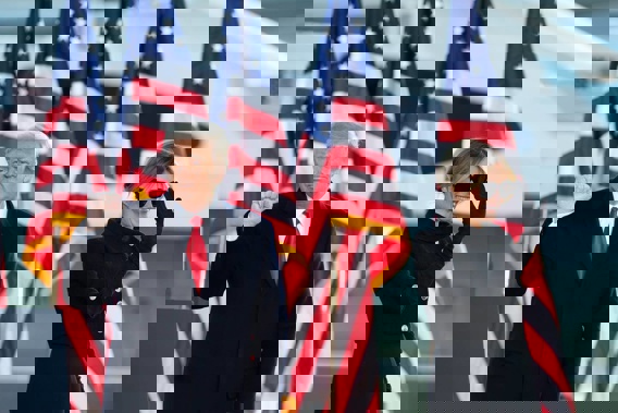 President Donald Trump and first lady Melania Trump wave to supporters after giving a speech at Andrews Air Force Base. Photo / AP