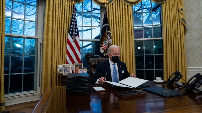 Joe Biden's first actions as President. (Photo / AP)