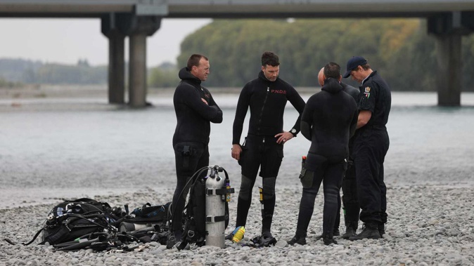 The dive squad at the Waimakariri River on Monday. (Photo / George Heard)