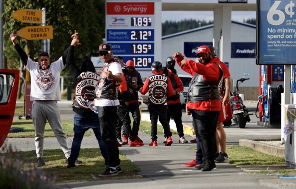 The gang members roared through the quiet North Canterbury town of Amberley on Friday. Photo / George Heard