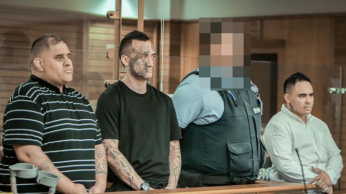 Steven Kingi, left, Jessee Burns, a court security guard, and Stewart Hubbard in the dock at the High Court in Napier on Thursday. Photo / NZME