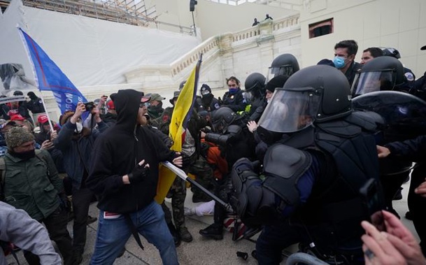 Rioters clash with police during the Capitol Hill Siege on January 6th. Photo / AP