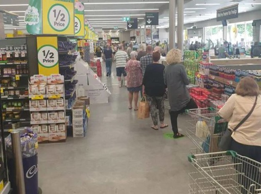 Long queues at a Melbourne supermarket after today's lockdown announcement. Photo / NZ Herald