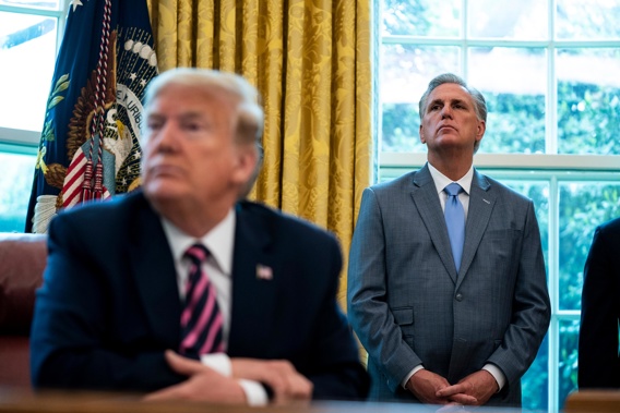 Former US President Donald Trump with House Republican leader Kevin McCarthy (right) in the Oval Office