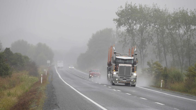 Roads south of Whangārei are busy with traffic with the rain making visibility difficult. Photo / Michael Cunningham
