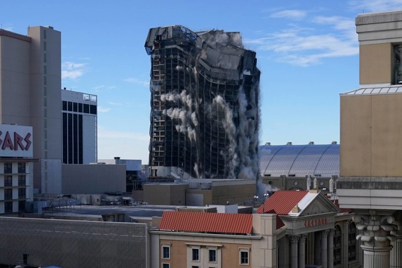 Overall, it took the structure less than 20 seconds to implode. (Photo / AP)
