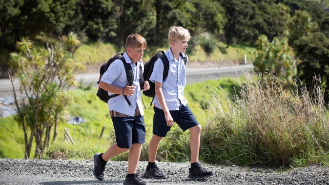 Kaipara College students Ethan Hepper (left) and Kael McFarlane are barred from the school bus on Helensville's winding Inland Road because they live within 4.8km of school. Photo / Sylvie Whinray