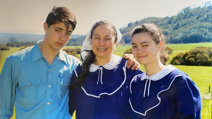 Former Gloriavale resident Sharon Ready (centre) with two of her 13 children, David and Constance. Photo / Supplied