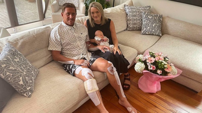 Ben Searancke recovering at home with his wife Jenny and daughter Sylvie Hariata. (Photo / NZ Herald)