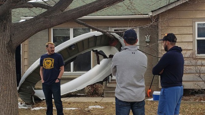 A United Airlines flight returns to the airport as police receive reports of airplane debris in neighborhoods outside Denver. (Supplied to CNN)