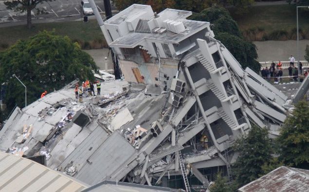 An aerial view of rescue workers searching for survivors on the Pyne Gould Corporation building which collapsed after the 6.3 earthquake in Christchurch. (Photo / NZ Herald)