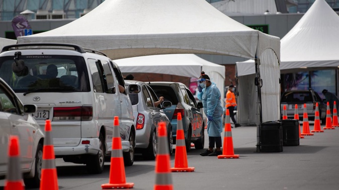 A queue waiting to get tested for Covid-19 at the Community Testing Centre, Fair Mall, Otara. Photo / Sylvie Whinray