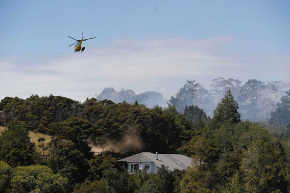 Emergency services respond to a 4ha vegetation fire in Greenhithe. (Photo / Dean Purcell)