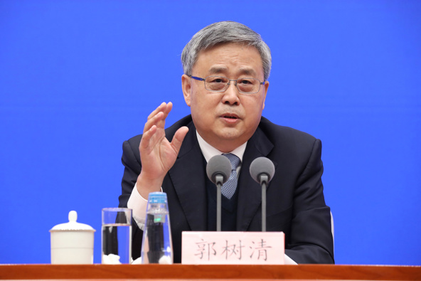 Guo Shuqing, the Communist Party boss at the People's Bank of China, told reporters in Beijing on Tuesday that confidence in Chinese markets could be hit by volatility around the world. (Photo / Getty)