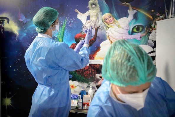 Medical staff prepare an Astra Zeneca Covid-19 vaccine shot at a centre in Bucharest, Romania. Photo / AP