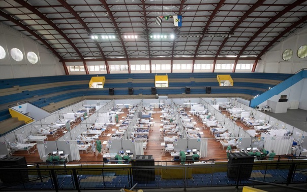 Covid patients lie on beds at a field hospital set inside an indoor sports stadium in Santo Andre, on the outskirts of Sao Paulo. Photo / AP