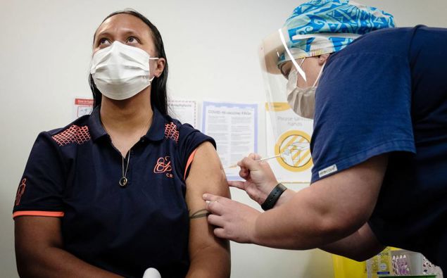 Lynette Faiva was the first New Zealand first MIQ worker to recieve the vaccine. (Photo / NZ Herald)