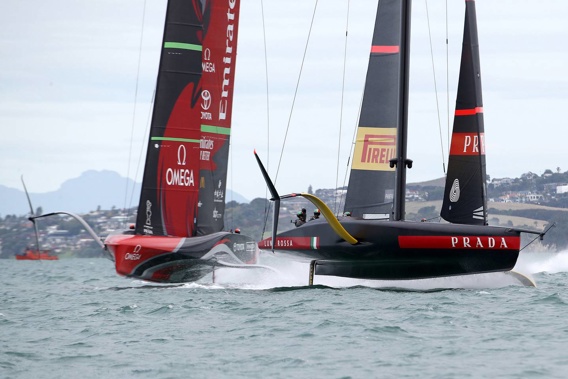 Team New Zealand and Luna Rossa battle it out in race one of the America's Cup Match. Photo / Getty Images