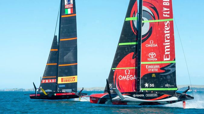 Team New Zealand and Luna Rossa battle it out in race one of the America's Cup Match. Photo / Getty Images