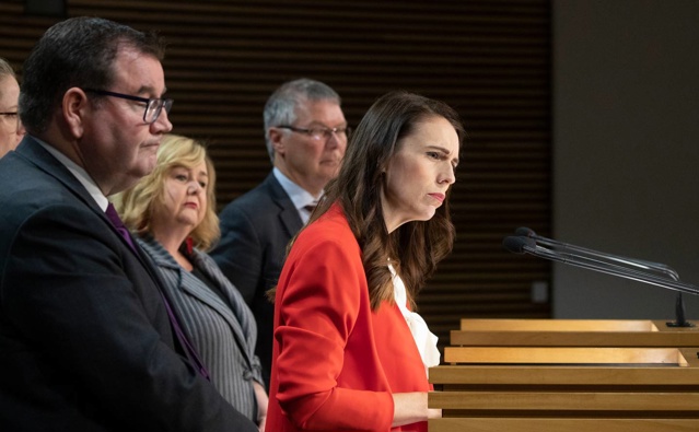 Prime Minister Jacinda Ardern and her colleagues announce a range of measures to counter housing speculation in the Beehive on Tuesday. Photo / Mark Mitchell