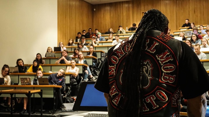 Sonny Fatu of the Waikato Mongrel Mob Kingdom, here talking to Canterbury University students, has been trying to instil new values. Photo / Katie Harris