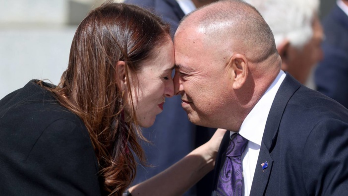 Prime Minister Jacinda Ardern shares a hongi with Cook Islands Prime Minister Mark Brown in Auckland yesterday. Photo / Getty Images