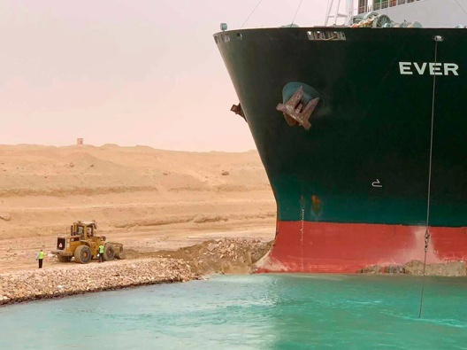 The Ever Given is a 200-tonne, 400m long vessel that can carry 18,000 containers. (Photo / AP)