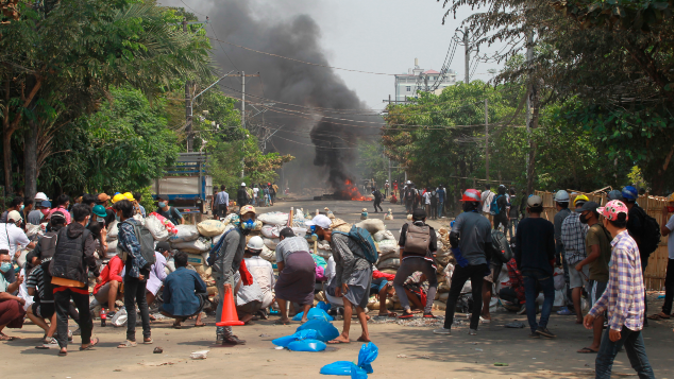Protesters in Myanmar returned to the streets Sunday to press their demands for a return to democracy, just a day after security forces killed more than 100 people in the bloodiest day since last month's military coup.