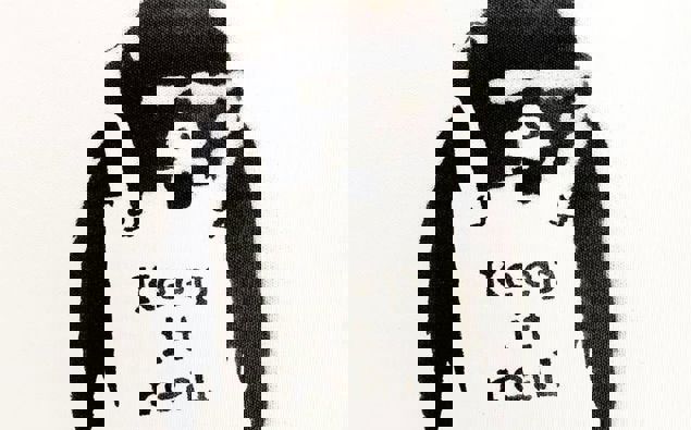 Keep it Real, Banksy's 2003 artwork depicting a chimpanzee wearing a sandwich board. Photo / Supplied