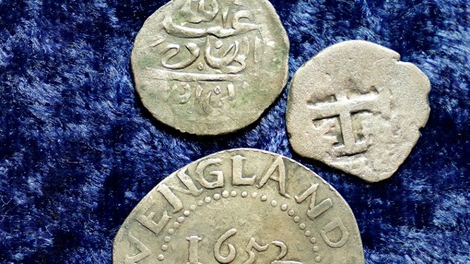 The Arabian coin was found at a farm, in Middletown, R.I., in 2014 by metal detectorist Jim Bailey, who contends it was plundered in 1695 by English pirate Henry Every from Muslim pilgrims sailing home to India after a pilgrimage to Mecca. (Photo / AP)