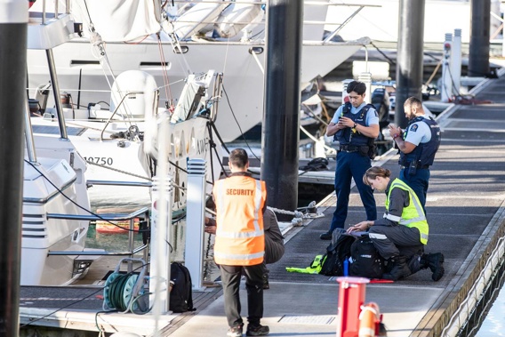 Police and maritime investigators try to piece together events leading up to a 25-year-old going overboard from charter boat yesterday. Photo / Michael Craig