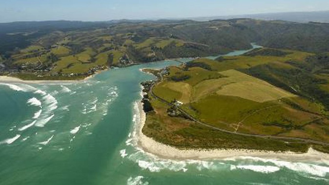 A boat has capsized at the Taieri Mouth bar with several people on it. Photo / ODT