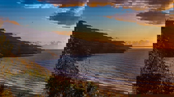 The top locations for Australians booking baches through Bachcare are Raglan, pictured, Tauranga, Waiheke, Marlborough, Mt Maunganui and Marlborough Sounds. Photo / Callum Hill, Unsplash