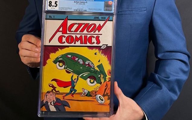 This photo provided by Metropolis Collectibles on Tuesday, April 6, 2021, shows Vincent Zurzolo, co-owner of ComicConnect, holding Action Comics first edition 1938 comic book marking Superman's first appearance, which has sold for an historic, record-breaking US$3,250,000