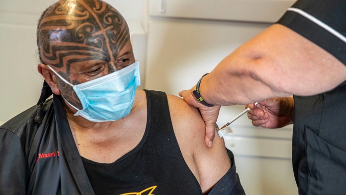 Manurewa Marae Board Chair Rangi McLean receives his first Covid-19 vaccination. (Photo / Michael Craig)