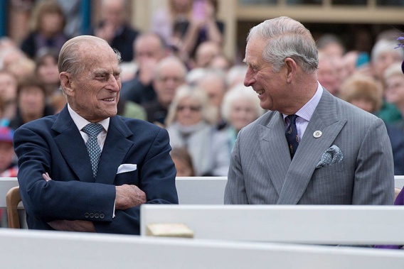 Prince Philip and his son Prince Charles listen to speeches before a statue of Queen Elizabeth, The Queen Mother was unveiled on October 27, 2016 in Poundbury, England. Photo / Getty Images