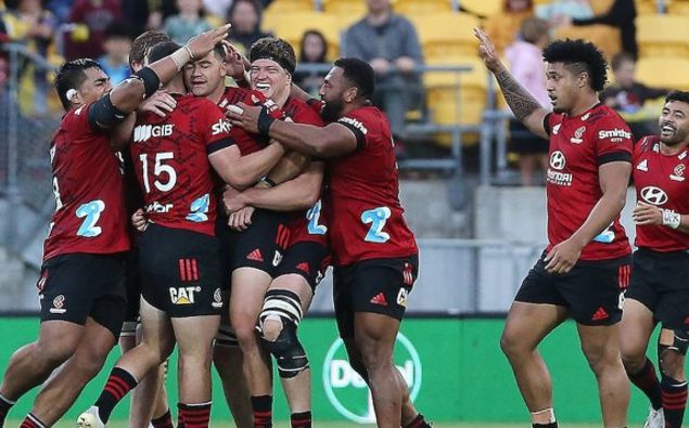 The Crusaders celebrate David Havili's winning drop goal. Photo / Photosport