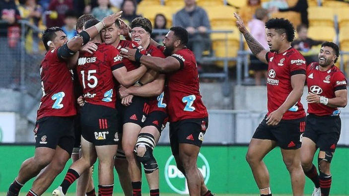 The Crusaders celebrate David Havili's winning drop goal. Photo / Photosport