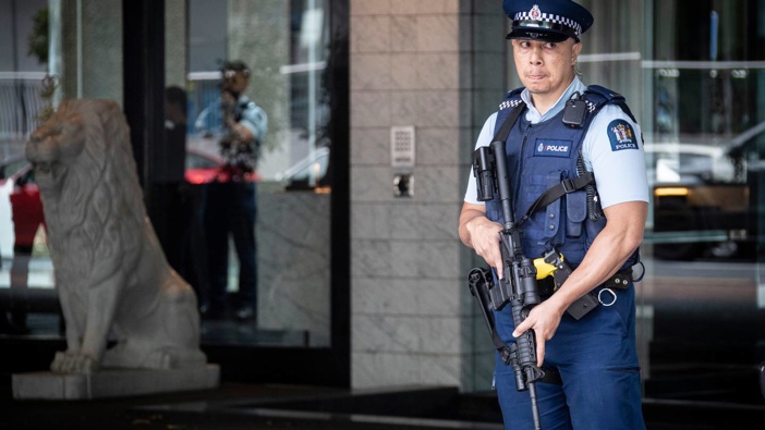 Armed police stand guard outside the Sofitel Hotel on Auckland's Viaduct responding to yesterday's firearms incident. Photo / Jason Oxenham