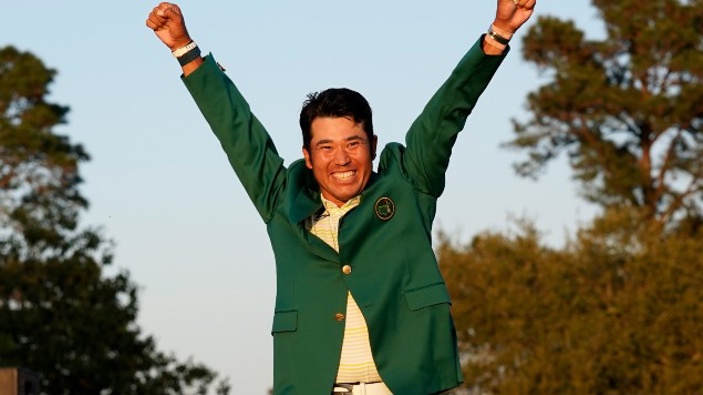 Hideki Matsuyama, of Japan, celebrates after putting on the champion's green jacket after winning the Masters golf tournament. (Photo / AP)