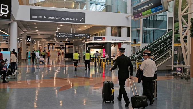 Seventeen workers who clean planes at Auckland Airport are now in self-isolation after a fellow cleaner tested positive for Covid this week. Photo / Alex Burton