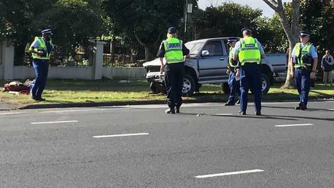 It's understood the red car swiped two cars and a ute after careering through the intersection. Photo / Belinda Feek
